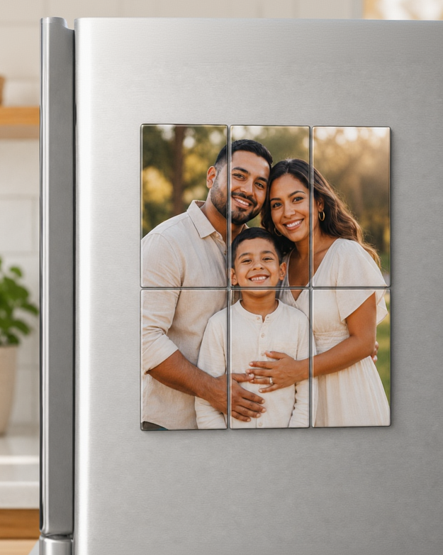 Stainless steel refrigerator with a family photo mosaic on a kitchen counter