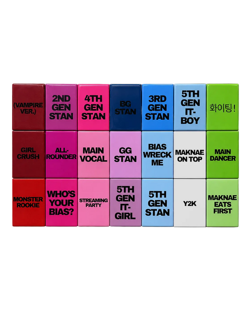 Colorful magnets with various text labels on a white background