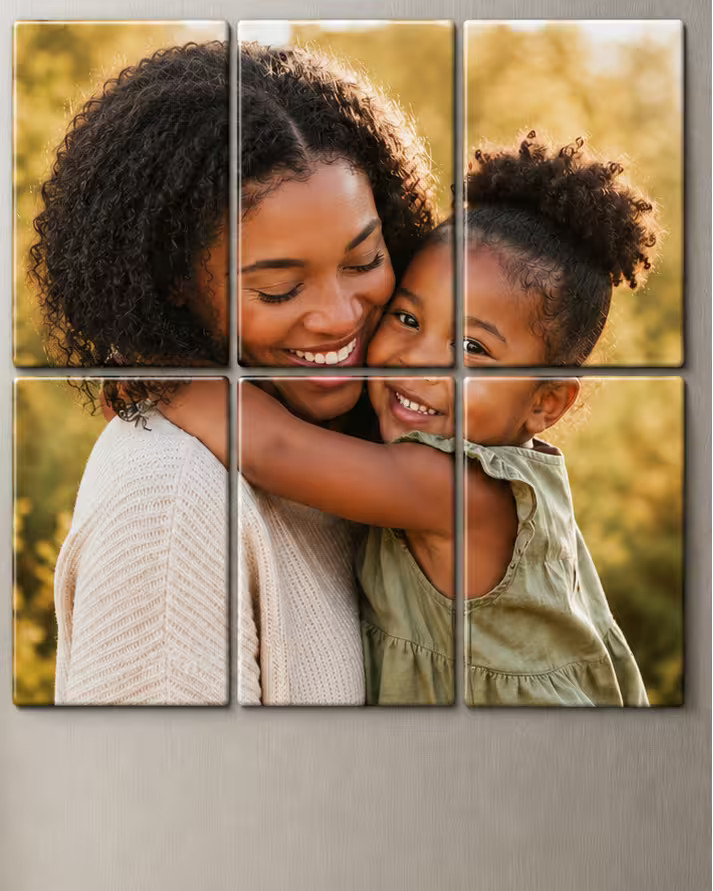 Photo magnet puzzle of a woman and a child hugging in a field, displayed on a wall.